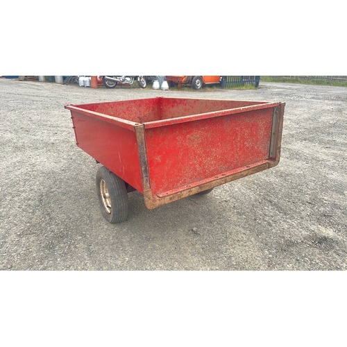 137 - An Agri-Fab 10 cu. ft. steel utility dump cart, red painted, with rectangular open tub, pin-hitch dr... 