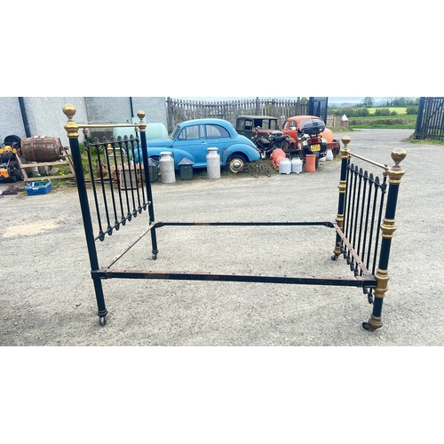 139 - Victorian brass and iron double bedstead, the black-painted end panels with finial-topped uprights a... 