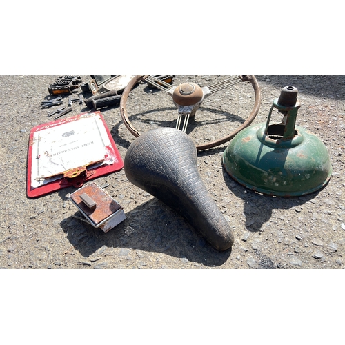14 - An assortment of items to include bicycle saddle. a three-spoke steering wheel, a green enamel lamp ... 