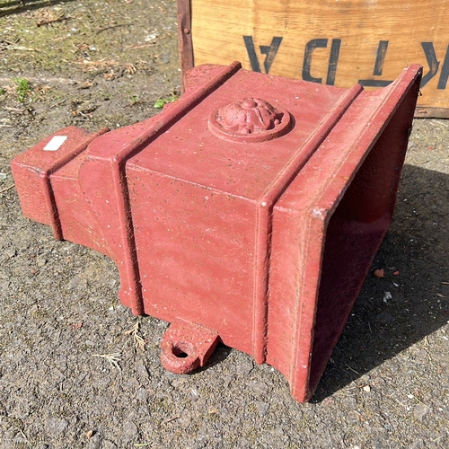 27 - A large antique cast iron rain hooper.