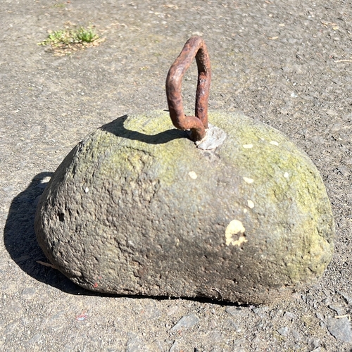 3 - An antique tether stone.