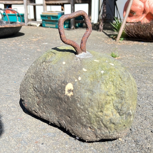 3 - An antique tether stone.