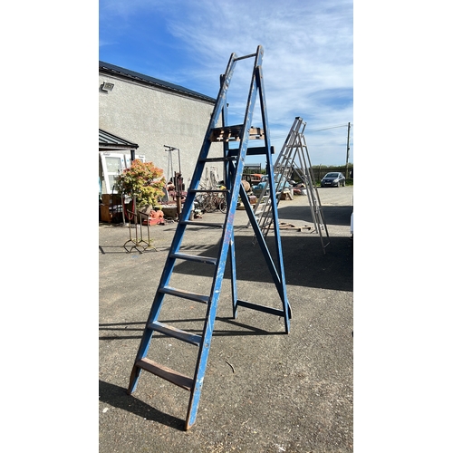 42 - A blue painted hardwood A-frame ladder with stepped treads.