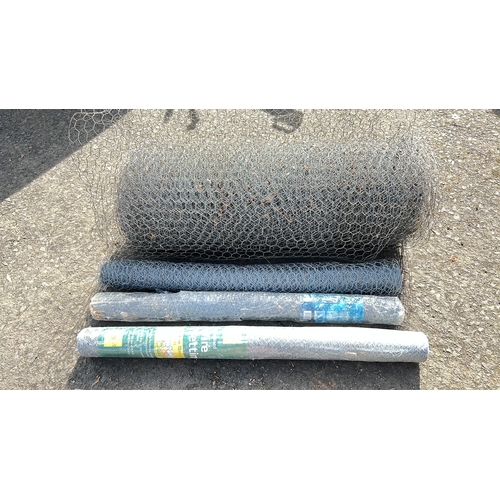49 - An assortment of rolls of chicken wire.