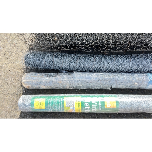 49 - An assortment of rolls of chicken wire.