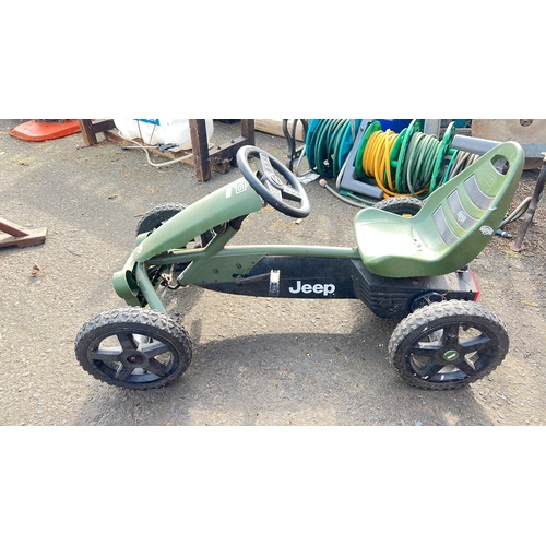 56 - Berg pedal go-kart in Jeep livery—moulded green seat with treaded inserts, three-spoke steering whee... 