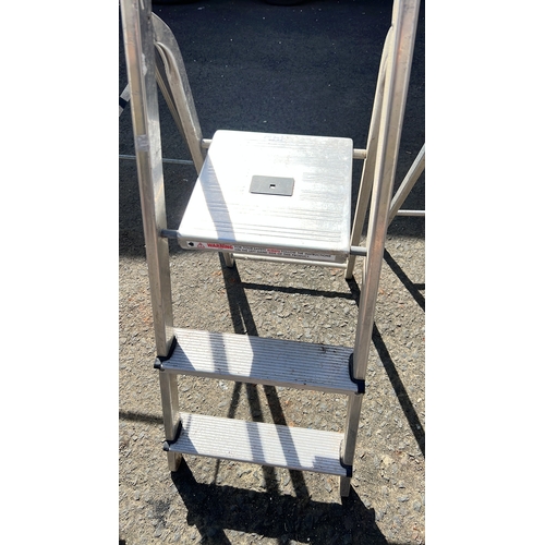 8 - An assortment of 3 step ladders.