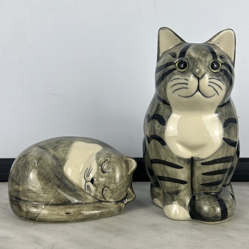 147 - 2 ceramic “Cumberland” cat figures.