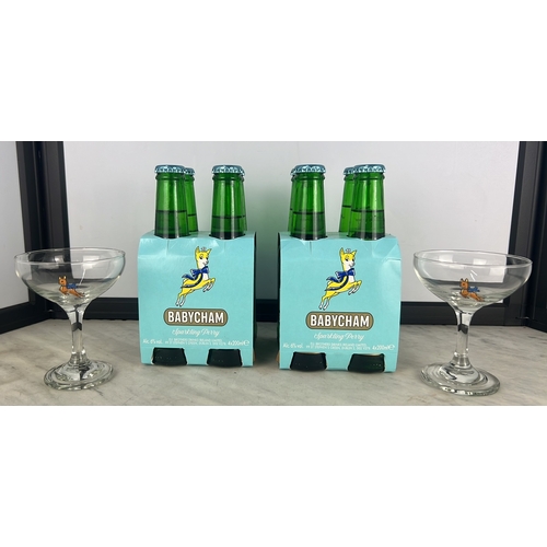 149 - Collection of Babycham, to include 2 four-bottle cartons & pair of vintage glasses.