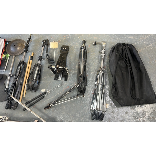 153 - Assorted drum hardware and cymbals including a 20in ride cymbal, two further cymbals, bell and clamp... 
