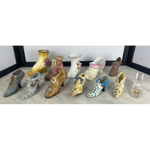 156 - A collection of shoe- and boot-form decorative ornaments, glazed ceramic and clear glass, variously ... 