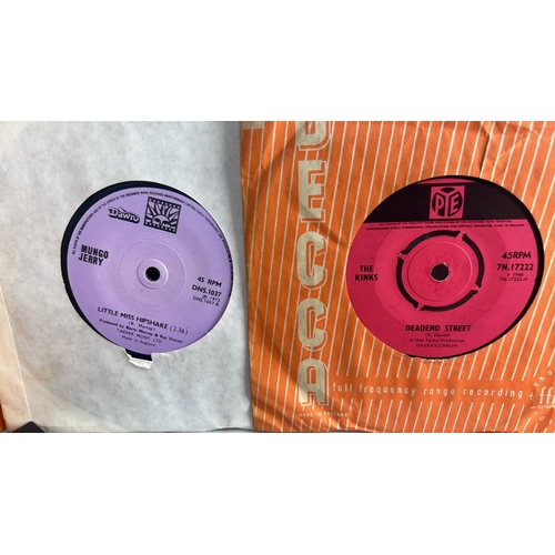 159 - A collection of vintage 45rpm singles/ records.