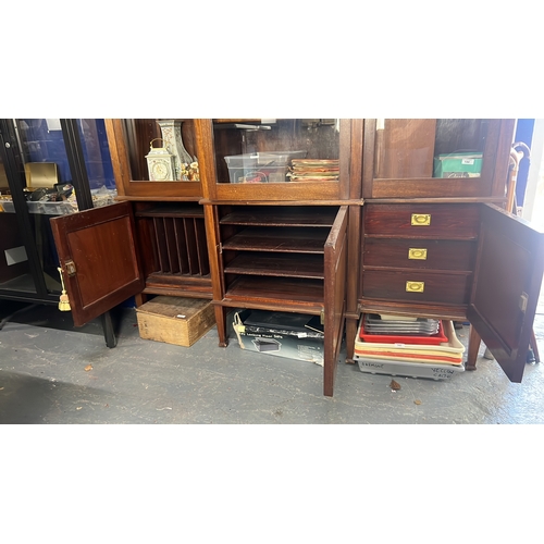 173 - Late Victorian mahogany breakfront bookcase, the cornice above glazed doors enclosing adjustable she... 