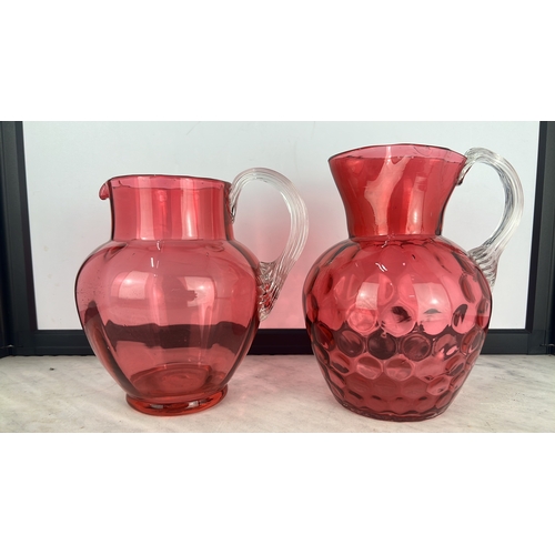 174 - 2 antique/ Victorian Ruby glass jugs.