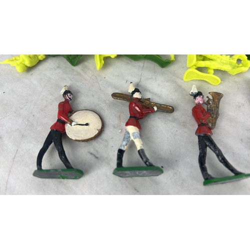 178 - 5 painted lead marching band figures & assortment of toy soldiers.