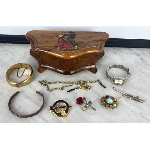 179 - A wooden jewellery box & contents.