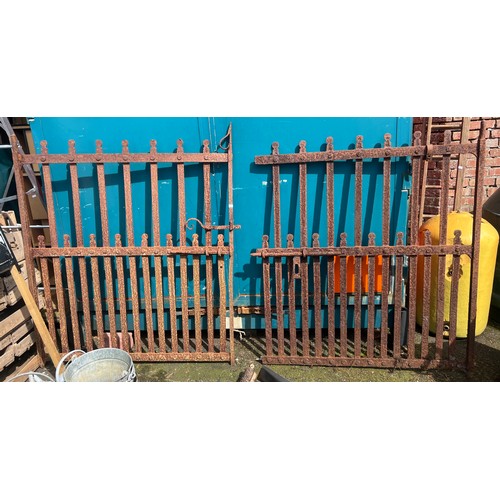 30 - A pair of antique blacksmith forged wrought iron gates, in the Vernacular style, 160cm height x 133c... 