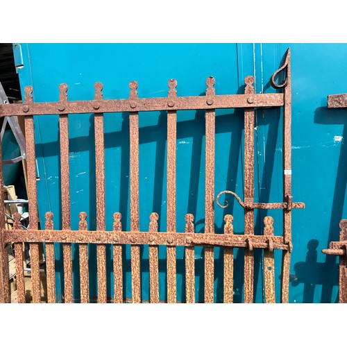 30 - A pair of antique blacksmith forged wrought iron gates, in the Vernacular style, 160cm height x 133c... 