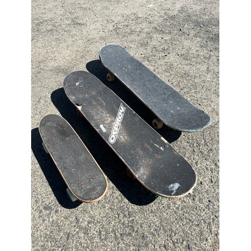 133 - Three skateboards.
