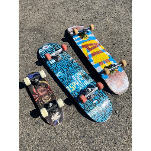 133 - Three skateboards.