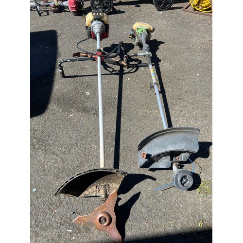 123 - Two petrol strimmers.