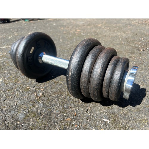 138 - A Barbell weight set.