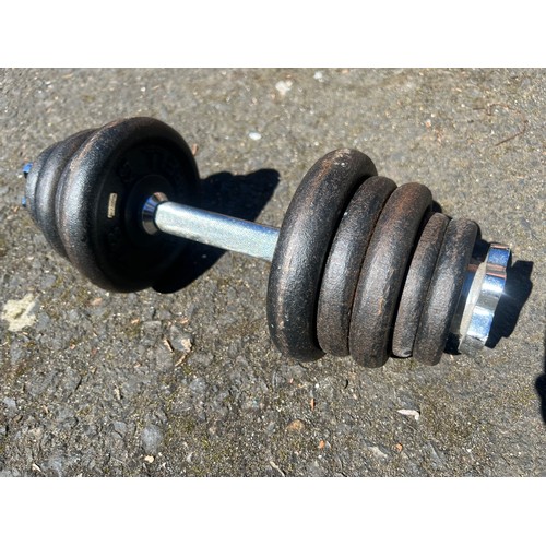 138 - A Barbell weight set.