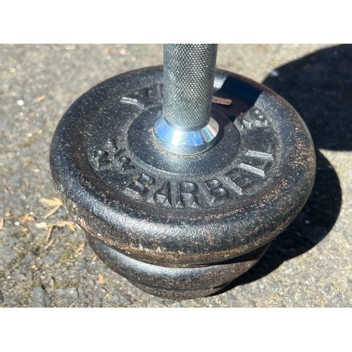 138 - A Barbell weight set.