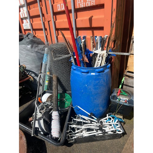 48 - A large lot of electric fence posts, cable, power pack and more.