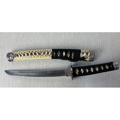 Decorative katana-style sword, the blade etched with maker's mark