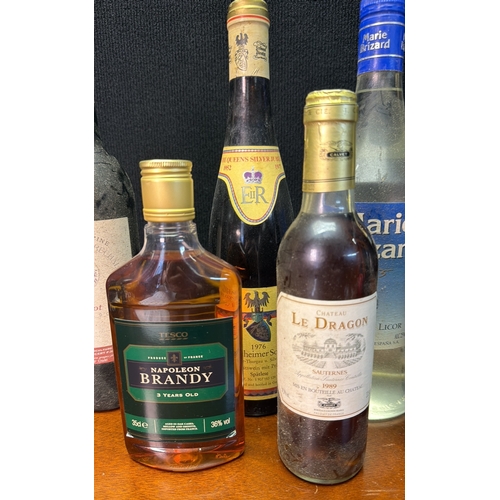 25 - A quantity of assorted bottled wines and spirits, including Domaine L’Epine Merlot 2001, Chateau Le ... 