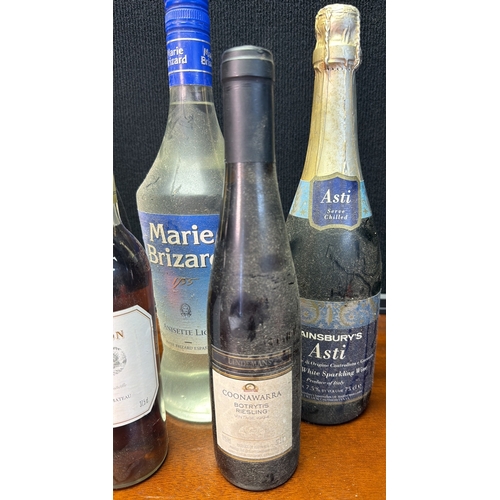 25 - A quantity of assorted bottled wines and spirits, including Domaine L’Epine Merlot 2001, Chateau Le ... 