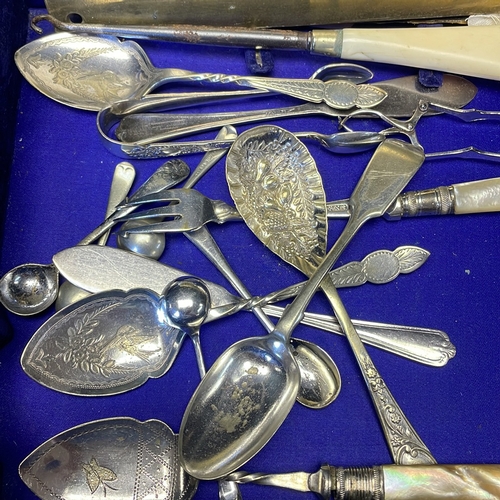 35 - A quantity of silver plate flatware and table accessories, including serving spoons, forks, butter k... 