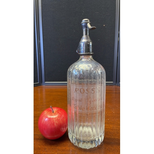 51 - Ross’s Royal Belfast Table Waters soda siphon, early 20th century—ribbed clear-glass bottle with aci... 