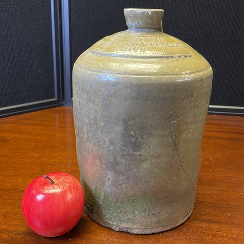 57 - Stoneware spirit flask or jug, of cylindrical body with rounded shoulders and short collar neck, the... 
