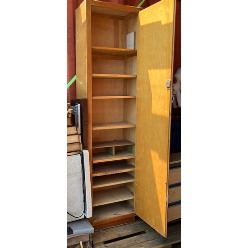 2 - 20th century tall wooden cabinet, the plain door with surface-mounted hinges and swing handle, enclo... 