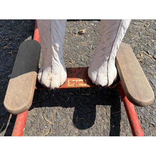 4 - Tru-Toys painted rocking horse in the form of a terrier, with moulded fur texture, glass eyes, and t... 