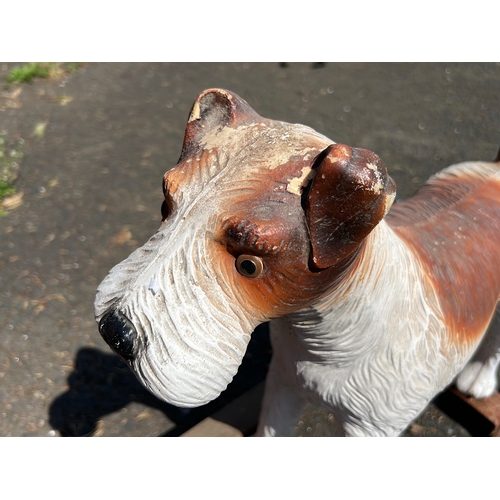 4 - Tru-Toys painted rocking horse in the form of a terrier, with moulded fur texture, glass eyes, and t... 