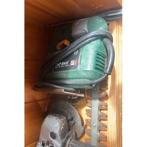 55 - A quantity of workshop and garden tools including a Black & Decker hedge trimmer with steel cutter b... 