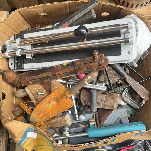 62 - A mixed lot of workshop tools and hardware, including a tile cutter, assorted hand tools with wooden... 