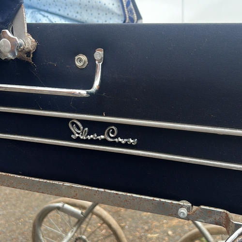 67 - A group of vintage nursery furnishings comprising a Silver Cross coach-built pram with chrome underc... 