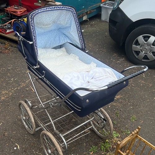 67 - A group of vintage nursery furnishings comprising a Silver Cross coach-built pram with chrome underc... 