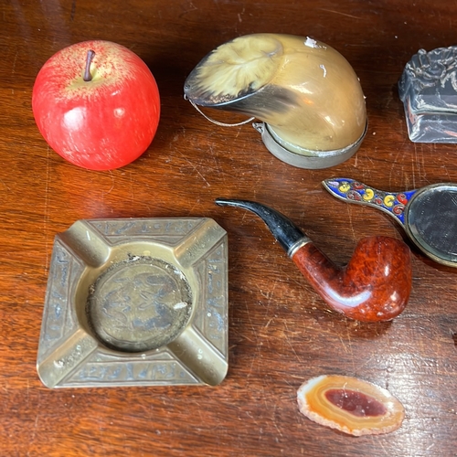 A group of desk accessories and small collectibles, including a marble ...