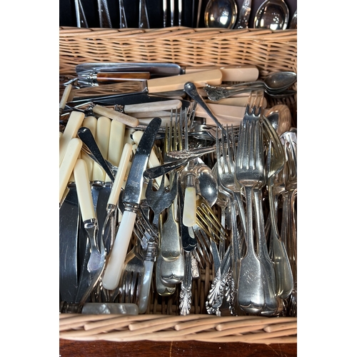 A collection of table cutlery, including boxed shell-pattern spoons, a ...