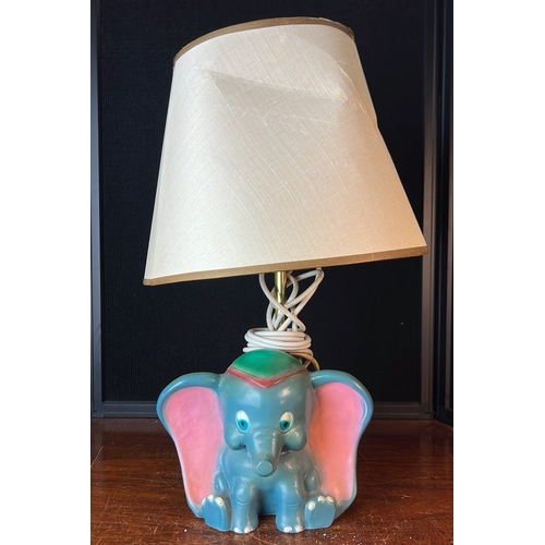 Elephant-form Dinsey Dumbo table lamp with a painted blue base, pink ...