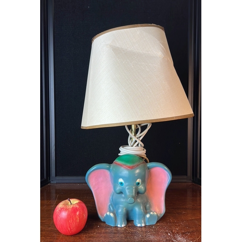 Elephant-form Dinsey Dumbo table lamp with a painted blue base, pink ...