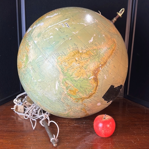 Large terrestrial globe with printed political and physical cartography ...