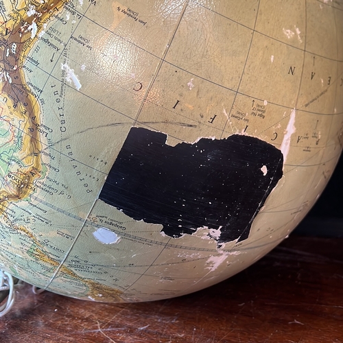 Large terrestrial globe with printed political and physical cartography ...