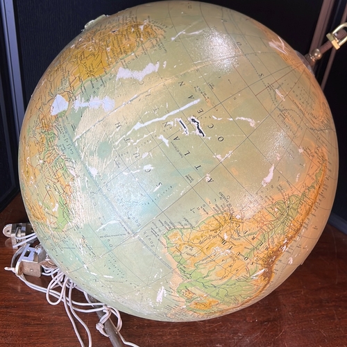 Large terrestrial globe with printed political and physical cartography ...