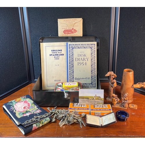 A mixed collection of mid-century ephemera and household objects ...
